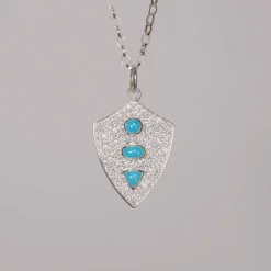 Fearless Shield with Turquoise and Pave White Sapphires