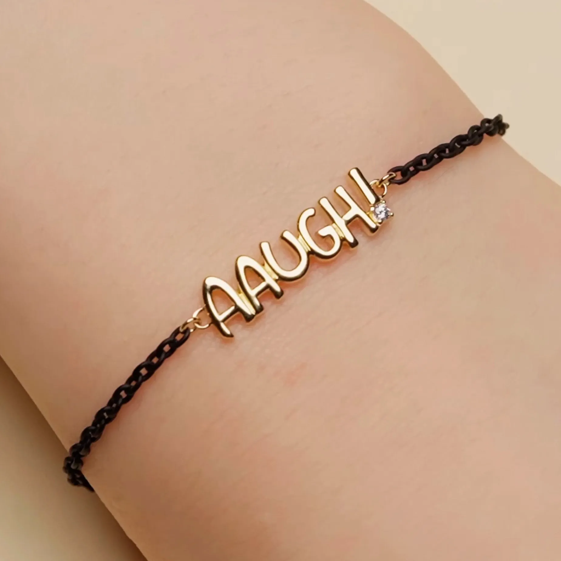 18K Yellow Gold and Black Steel “AAUGH!” Bracelet